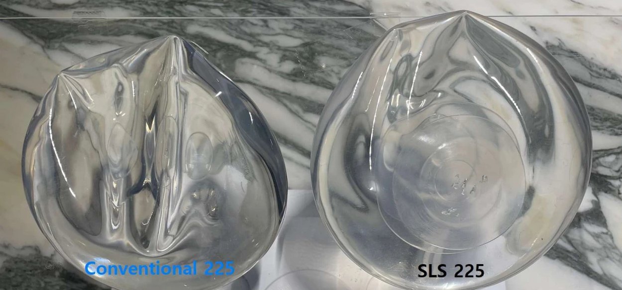 A standard 225 mL implant (left) next to a double-membrane prototype (right) of the same size