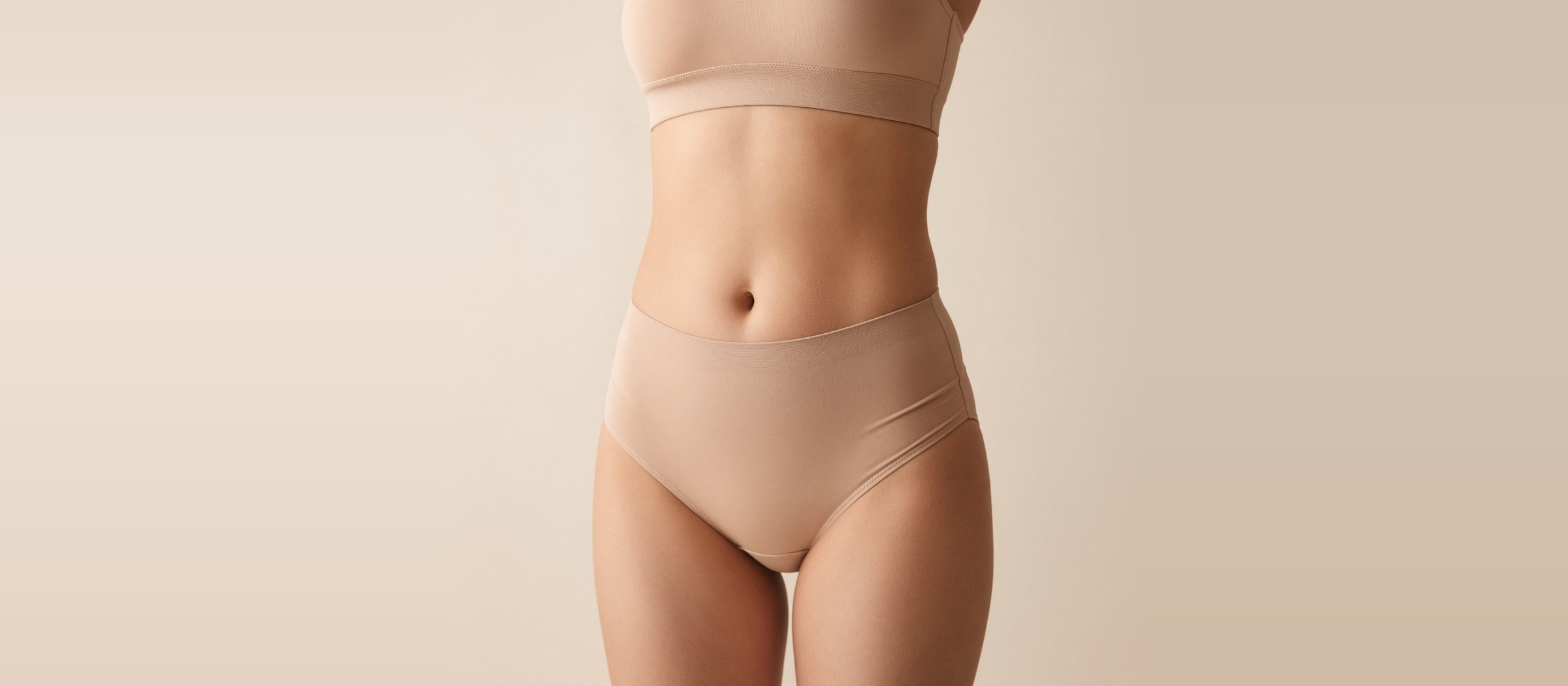 베이지 속옷을 입은 복부 정면(연출 이미지)