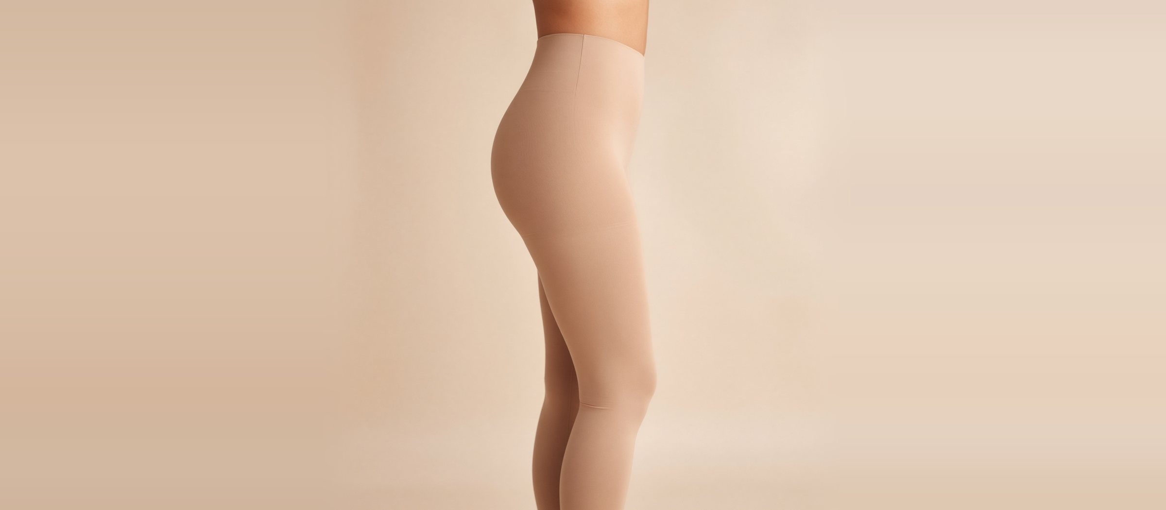 Lower body in leggings, side view (staged image)